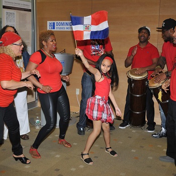 Gagá Pa'l Pueblo performing after opening reception for Sixteenth-Century La Española: Glimpses of the First Blacks in the Early Colonial Americas exhibition. CUNY Dominican Studies Institute Archives and Library, May 22, 2015