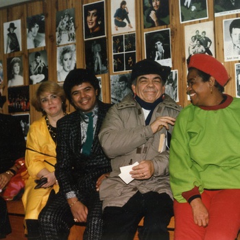 Singer Juan Lanfranco with suit (center), ca. 1980s
